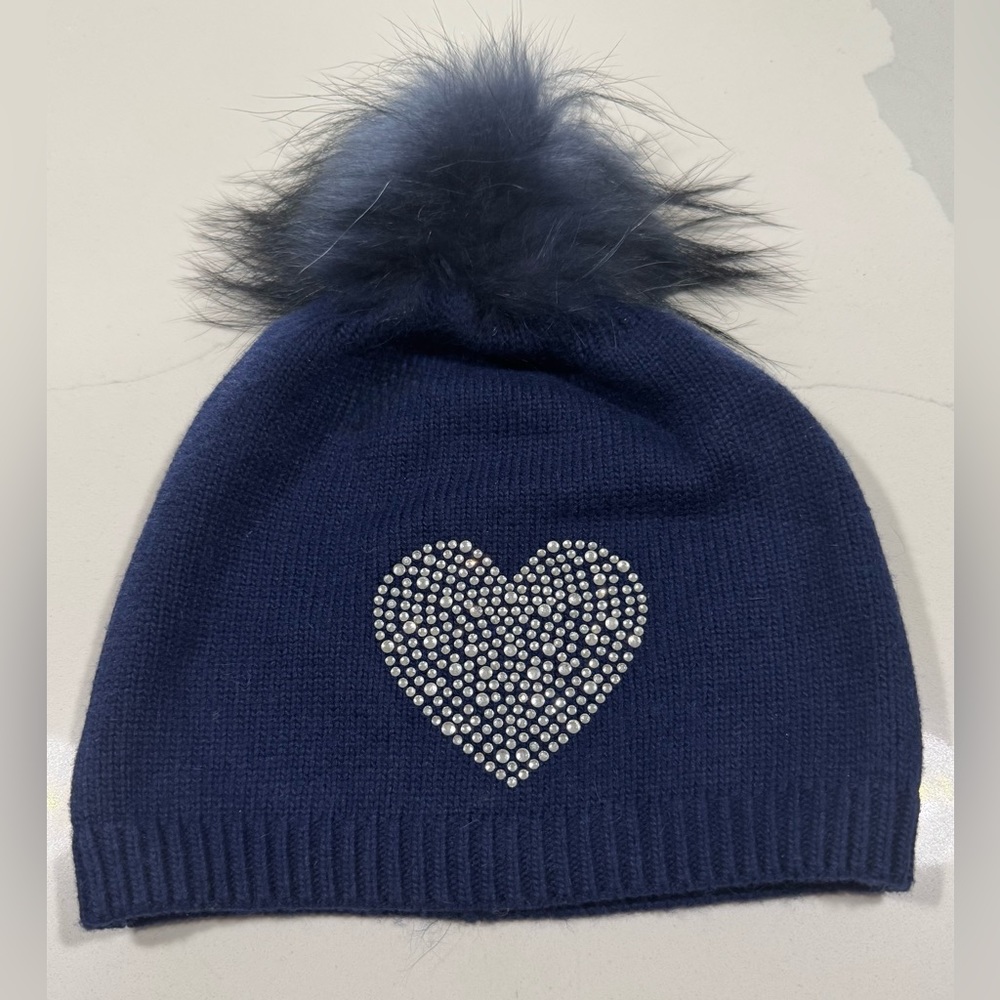 BLUE hat with bedazzled heart design and fur pom pom. One size (brand new)